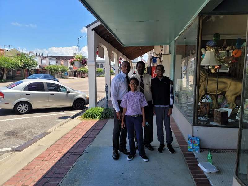 Luckett men celebrating Rev. Paul Luckett on Father's Day.
