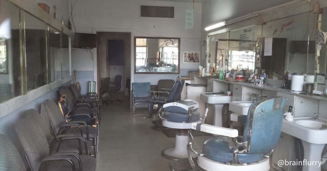 I'm in the chair. A woman walks in the barbershop with her child. The fellas start, "Man, Paul,…